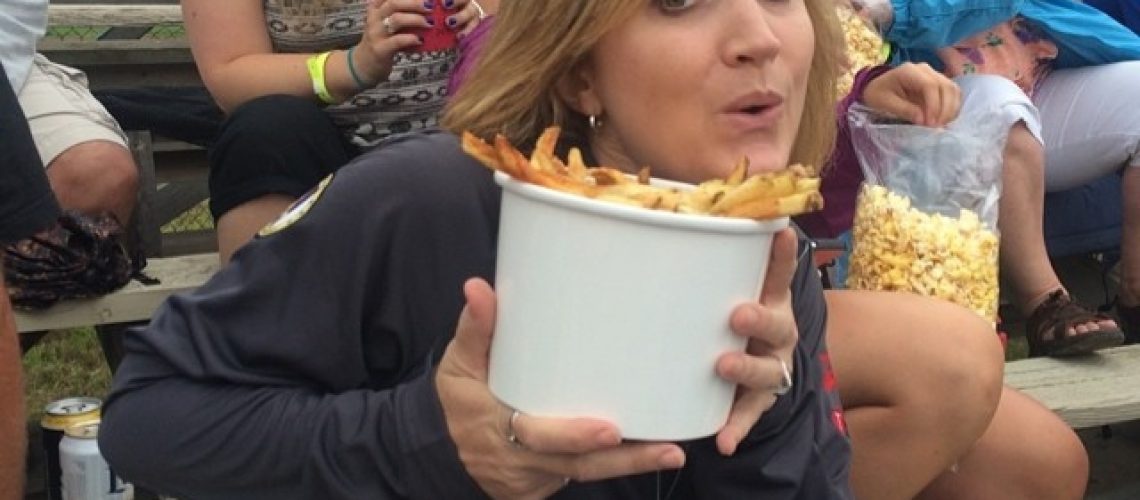 laura with a huge bucket of fries